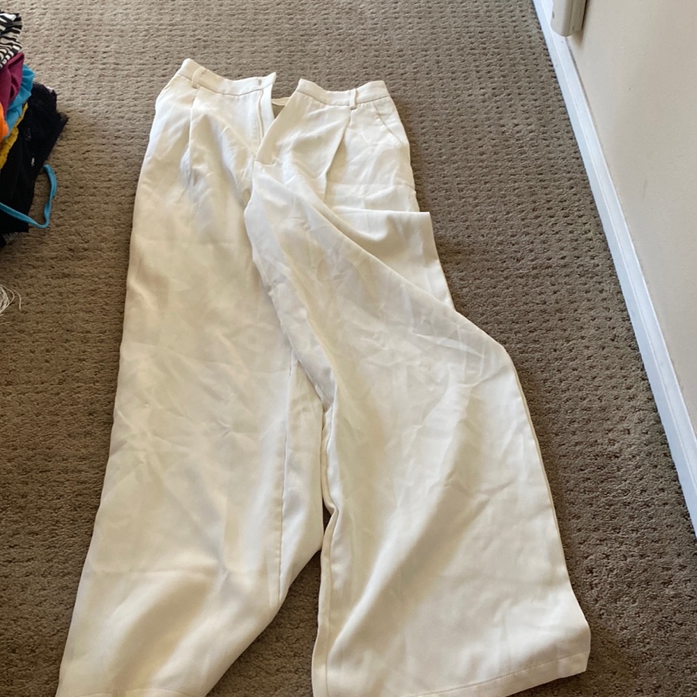 Cream wide leg trousers with pleats